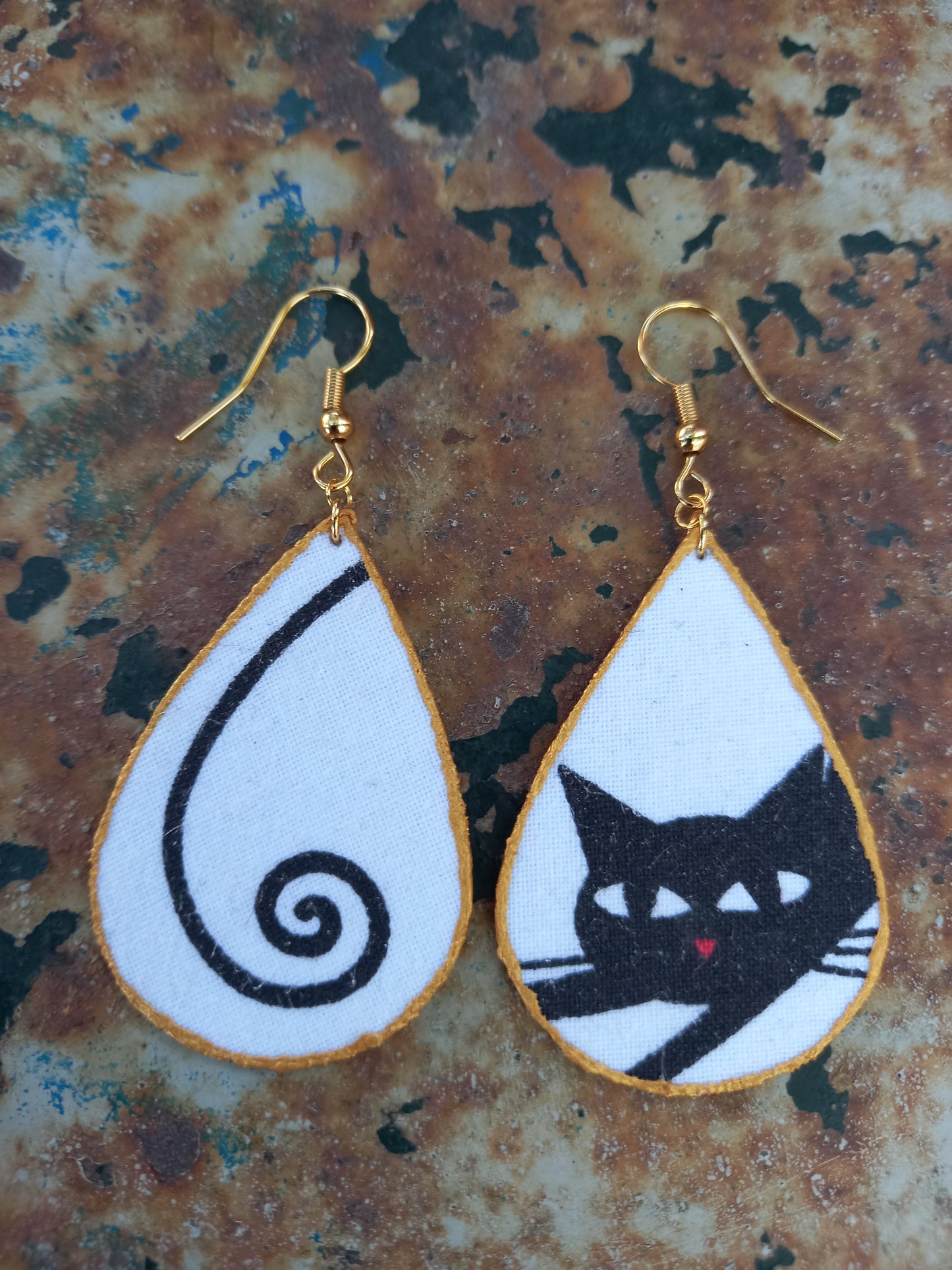 Brincos Kat, O Gato