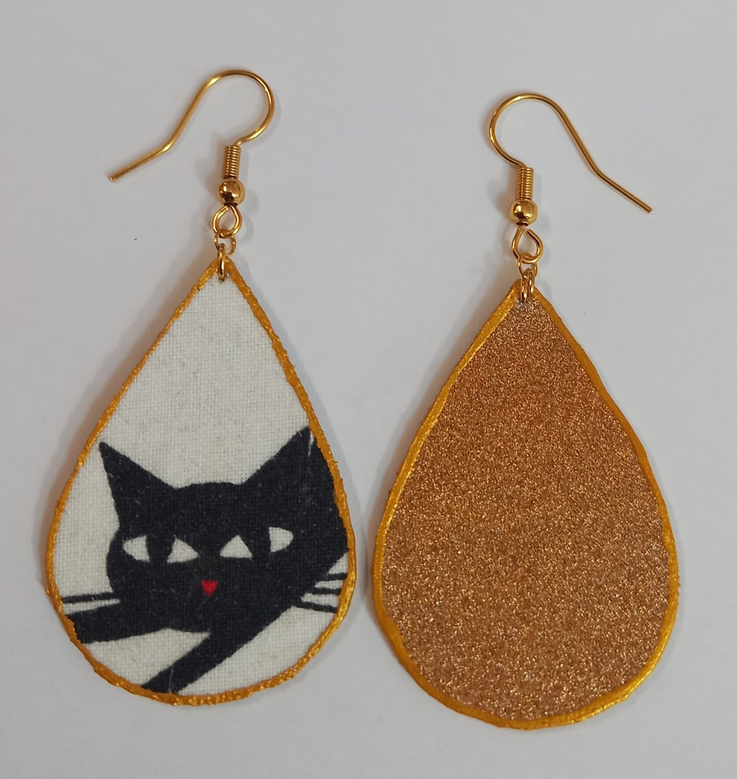 Brincos Kat, O Gato